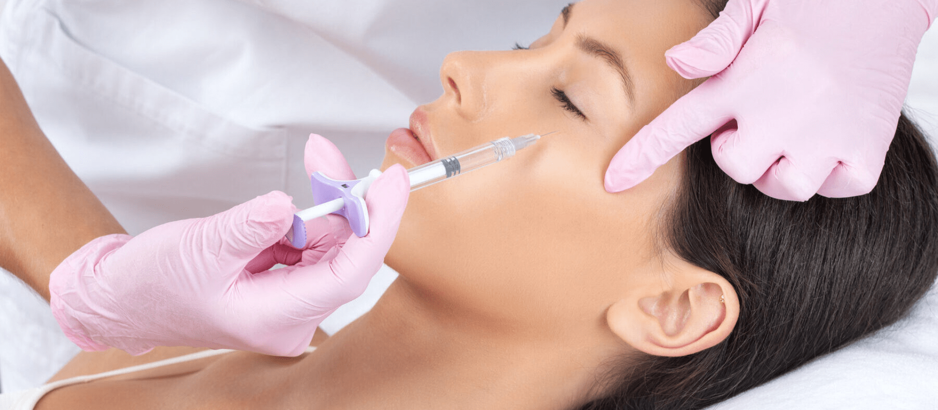 female getting botox in her cheeks