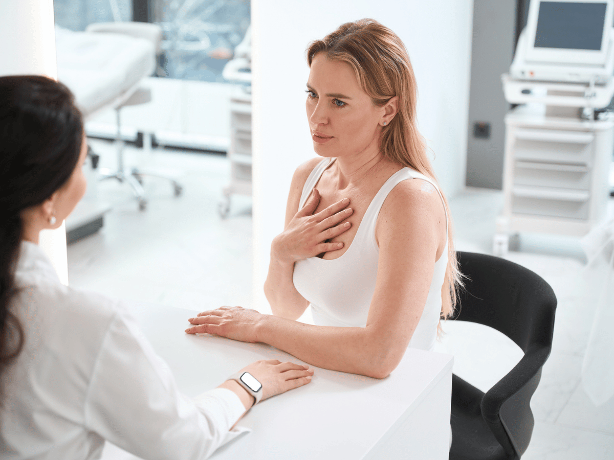 a girl talking to her dermatologist