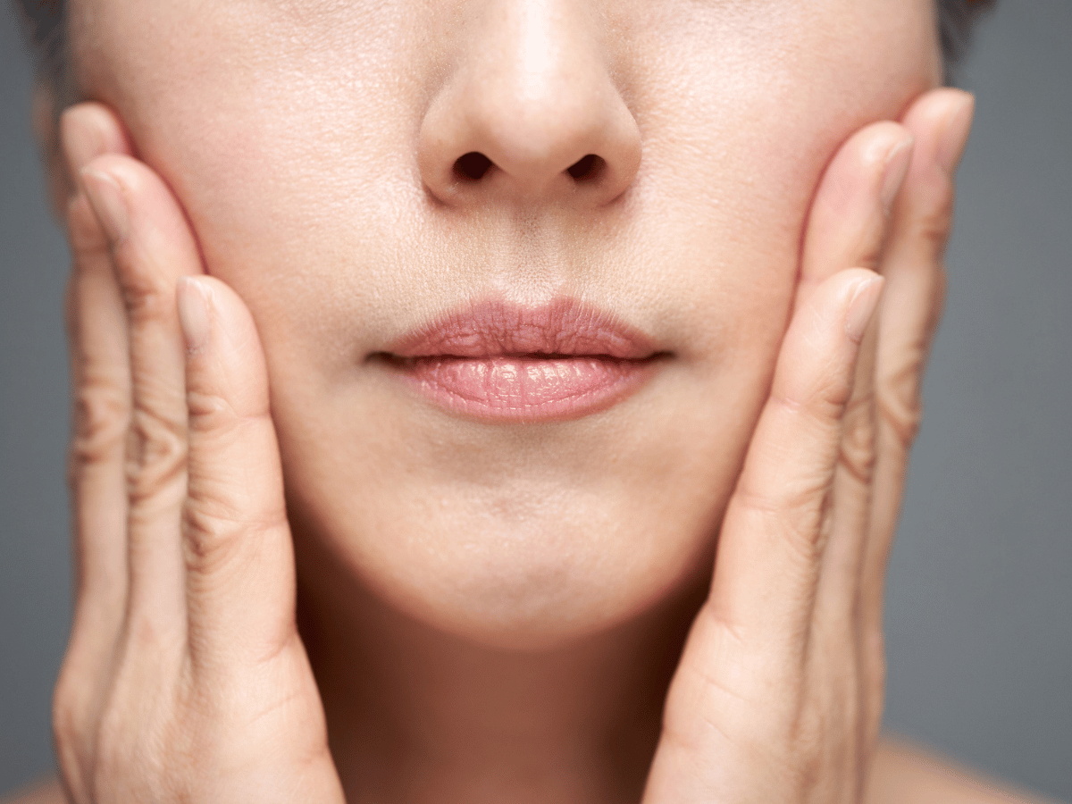 close up view of a girl's nose and mouth